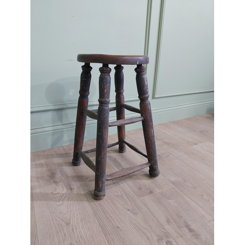 37 - Early 20th C. oak and elm stool raised on turned legs and four stretchers {55 cm H x 33 cm W x 33 cm... 