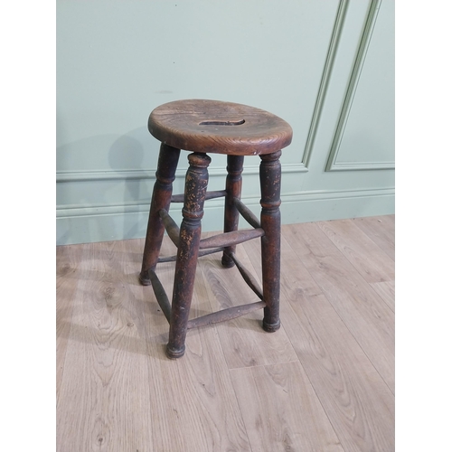 37 - Early 20th C. oak and elm stool raised on turned legs and four stretchers {55 cm H x 33 cm W x 33 cm... 