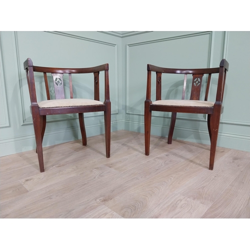 373 - Pair of Edwardian mahogany armchairs with upholstered seats {73 cm H x 53 cm W x 55 cm D}.