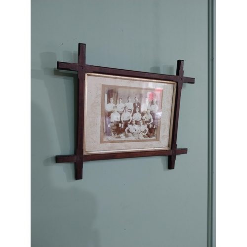 386 - Early 20th C. The Irish Football team black and white print mounted in oak frame {55 cm H x 65 cm W}... 