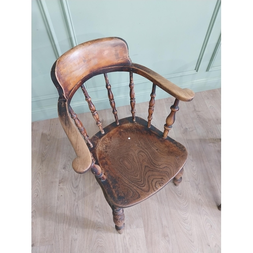 395 - Two 19th C. ash and elm smoker bow chairs raised on turned legs and two stretchers {88 cm H x 64 cm ... 