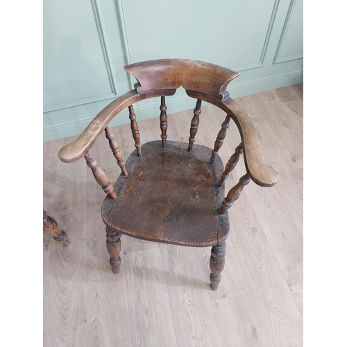 395 - Two 19th C. ash and elm smoker bow chairs raised on turned legs and two stretchers {88 cm H x 64 cm ... 