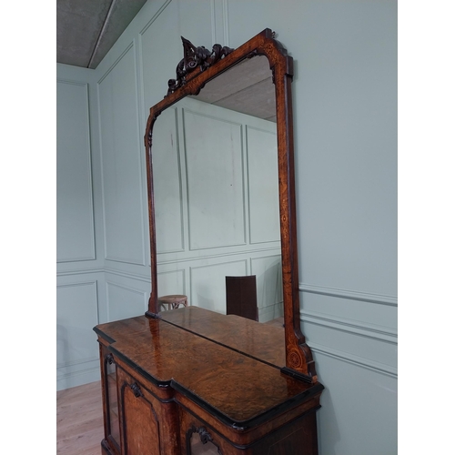 404 - Good quality burr walnut and satinwood inlaid cabinet with mirrored back raised on platform base