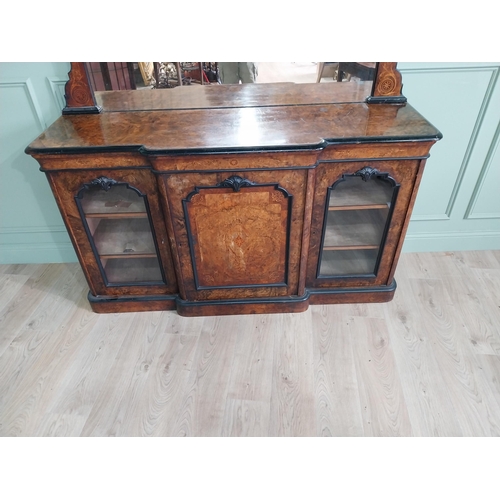 404 - Good quality burr walnut and satinwood inlaid cabinet with mirrored back raised on platform base