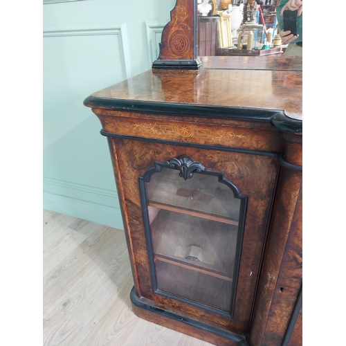 404 - Good quality burr walnut and satinwood inlaid cabinet with mirrored back raised on platform base