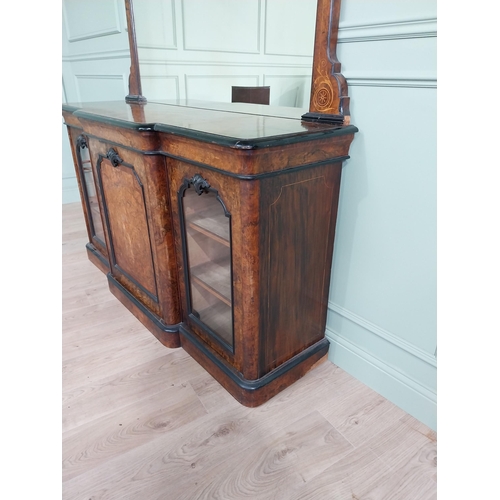 404 - Good quality burr walnut and satinwood inlaid cabinet with mirrored back raised on platform base