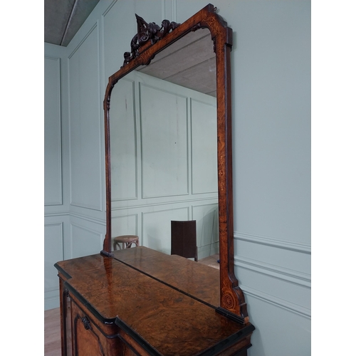 404 - Good quality burr walnut and satinwood inlaid cabinet with mirrored back raised on platform base