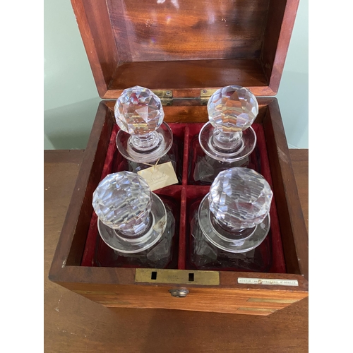 417 - Good quality 19th C. mahogany and brass bound decanter with four original cut lead crystal decanters... 