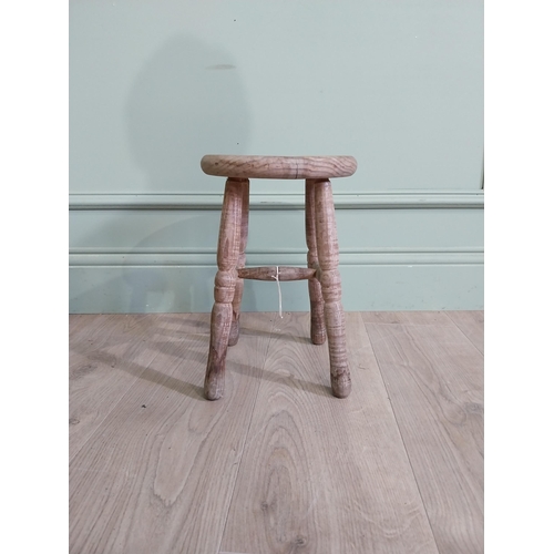 425 - Two early 20th C. pine milking stools {33 cm H x 30 cm W x 23 cm D and 33 cm H x 22 cm W x 22 cm D}.