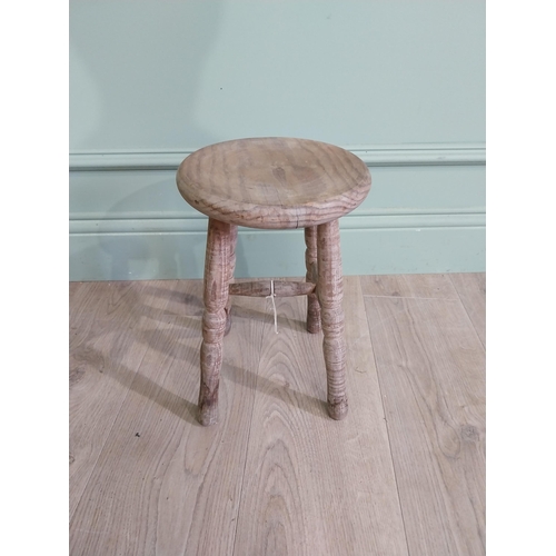 425 - Two early 20th C. pine milking stools {33 cm H x 30 cm W x 23 cm D and 33 cm H x 22 cm W x 22 cm D}.