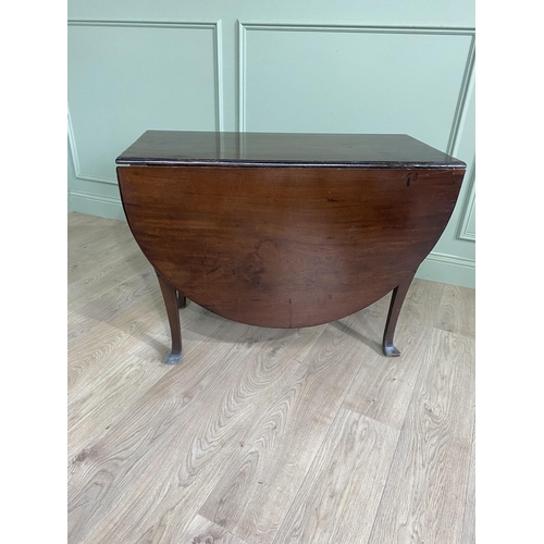 430 - Georgian mahogany drop leaf table raised on cabriole legs {71 cm H x 97 cm W x 47 cm D}.