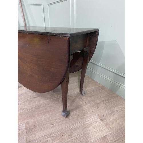 430 - Georgian mahogany drop leaf table raised on cabriole legs {71 cm H x 97 cm W x 47 cm D}.