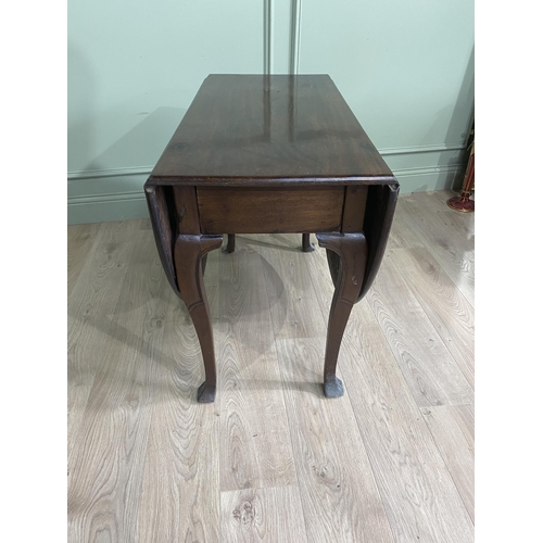 430 - Georgian mahogany drop leaf table raised on cabriole legs {71 cm H x 97 cm W x 47 cm D}.