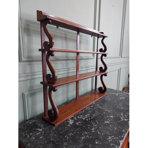 436 - 19th C. mahogany waterfall wall shelves {75 cm H x 83 cm W x 16 cm D}.