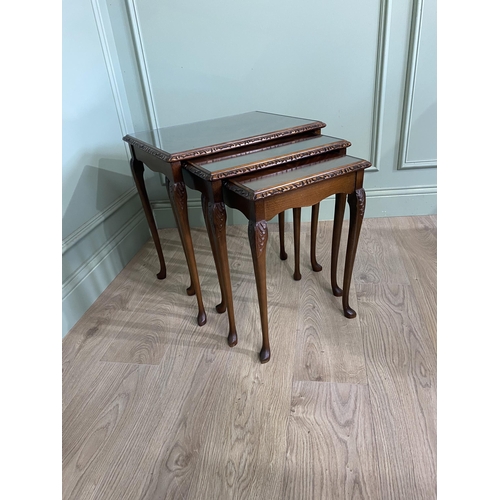 44 - Good quality mahogany nest of three tables with inset glass tops raised on cabriole legs {55 cm H x ... 