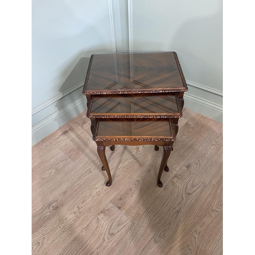 44 - Good quality mahogany nest of three tables with inset glass tops raised on cabriole legs {55 cm H x ... 