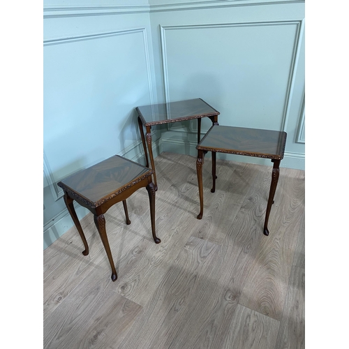 44 - Good quality mahogany nest of three tables with inset glass tops raised on cabriole legs {55 cm H x ... 