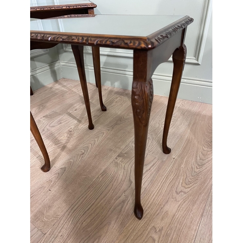 44 - Good quality mahogany nest of three tables with inset glass tops raised on cabriole legs {55 cm H x ... 