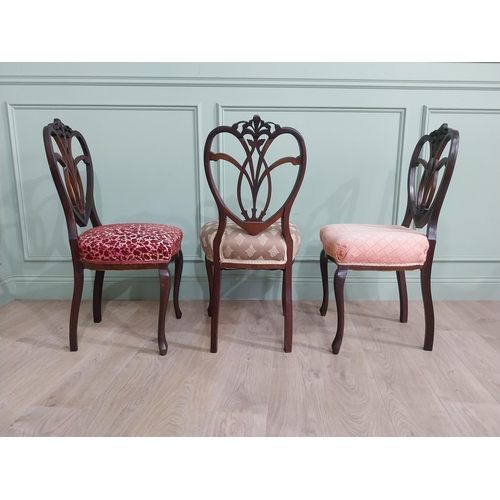 444 - Set of three Edwardian mahogany shield back side chairs with upholstered seat raised on cabriole leg... 