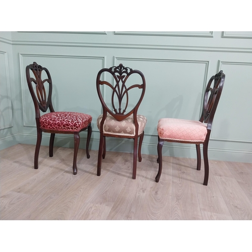 444 - Set of three Edwardian mahogany shield back side chairs with upholstered seat raised on cabriole leg... 