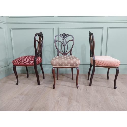 444 - Set of three Edwardian mahogany shield back side chairs with upholstered seat raised on cabriole leg... 