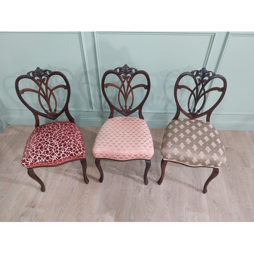 444 - Set of three Edwardian mahogany shield back side chairs with upholstered seat raised on cabriole leg... 