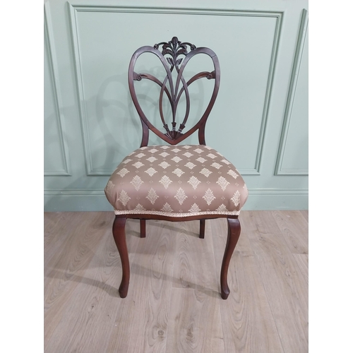 444 - Set of three Edwardian mahogany shield back side chairs with upholstered seat raised on cabriole leg... 