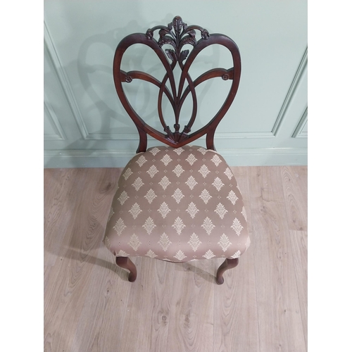 444 - Set of three Edwardian mahogany shield back side chairs with upholstered seat raised on cabriole leg... 