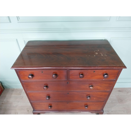 452 - 19th C. mahogany chest of drawers with two short drawers over three long graduated drawers raised on... 