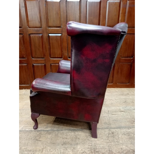 466A - Deep buttoned leather wingback fireside chair on Queen Ann legs {H 112cm x W 90cm x D 90cm } - NOT A... 