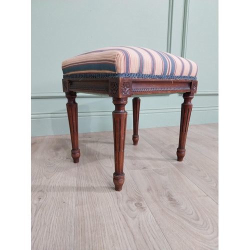 473 - Edwardian French mahogany footstool with upholstered seat raised on reeded legs {40 cm H x 42 cm W x... 