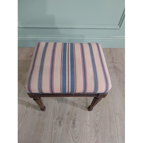 473 - Edwardian French mahogany footstool with upholstered seat raised on reeded legs {40 cm H x 42 cm W x... 