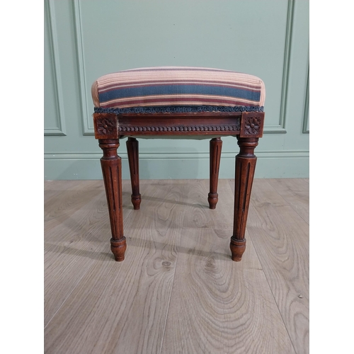 473 - Edwardian French mahogany footstool with upholstered seat raised on reeded legs {40 cm H x 42 cm W x... 