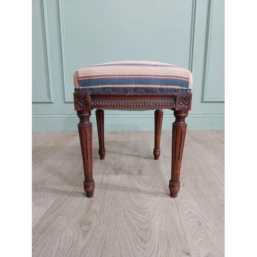 473 - Edwardian French mahogany footstool with upholstered seat raised on reeded legs {40 cm H x 42 cm W x... 