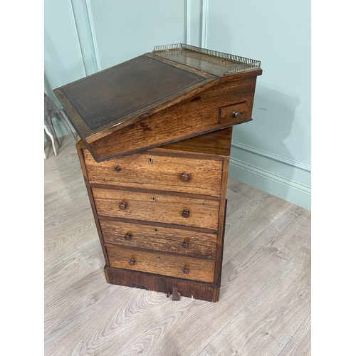 477 - 19th C. rosewood Davenport with brass gallery back, inset leather top, fitted interior and four draw... 