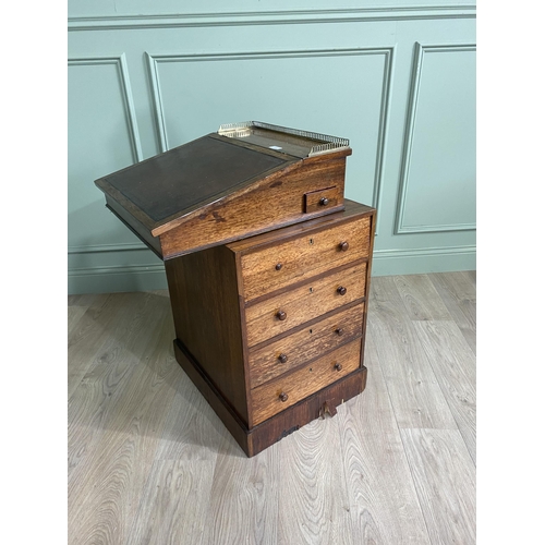 477 - 19th C. rosewood Davenport with brass gallery back, inset leather top, fitted interior and four draw... 