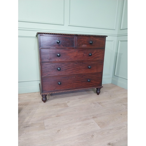 486 - 19th C. mahogany chest of drawers with two short drawers over three long graduated drawers raised on... 