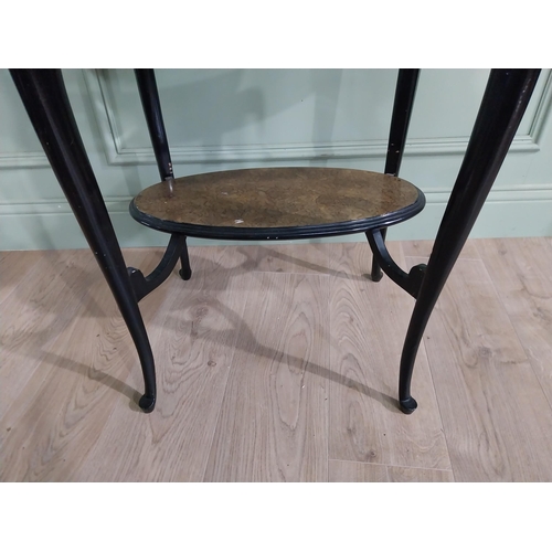 495 - Ebonised mahogany and faux burr walnut lamp table with inset glass top raised on cabriole legs {70 c... 