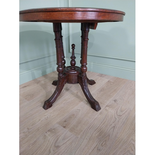 497 - Edwardian walnut and satinwood inlaid centre table raised on four turned and four out swept feet {69... 