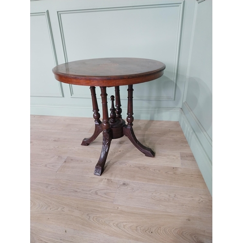 497 - Edwardian walnut and satinwood inlaid centre table raised on four turned and four out swept feet {69... 