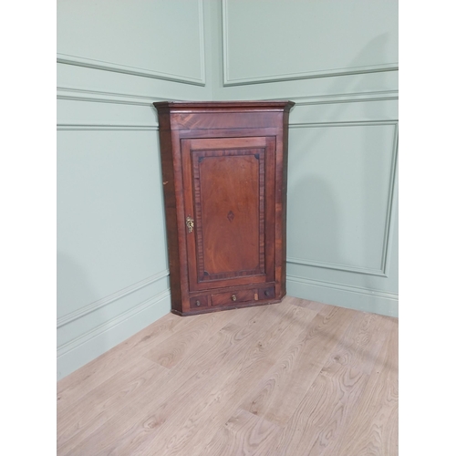 500 - 19th C. mahogany cross banded hanging corner cupboard with single door above three drawers {118 cm H... 