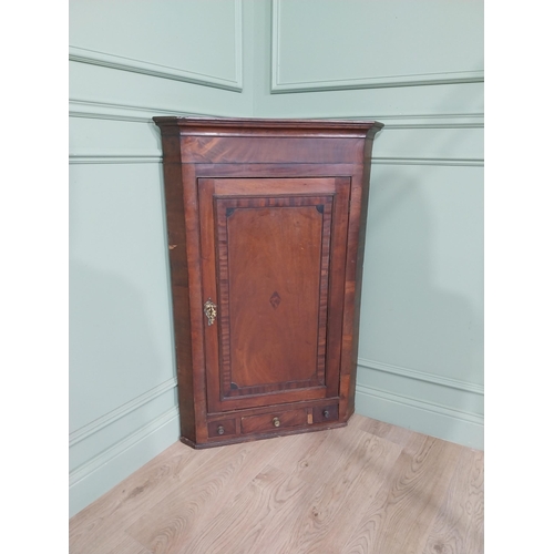 500 - 19th C. mahogany cross banded hanging corner cupboard with single door above three drawers {118 cm H... 