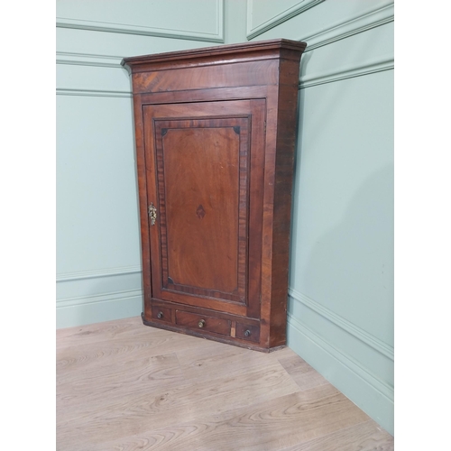 500 - 19th C. mahogany cross banded hanging corner cupboard with single door above three drawers {118 cm H... 