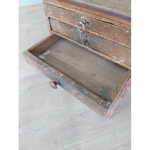 506 - 19th C. scumbled pine watch makers cabinet with eight graduated drawers {58 cm H x 43 cm W x 35 cm D... 