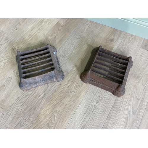 507 - Pair of Victorian cast iron foot scrapers {10 cm H x 32 cm W x 32 cm D}.