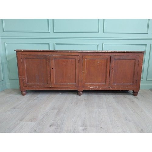 51 - 19th C. Irish painted pine side cabinet with four doors raised on bun feet {91 cm H x 247 cm W x 48 ... 