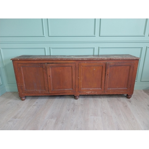 51 - 19th C. Irish painted pine side cabinet with four doors raised on bun feet {91 cm H x 247 cm W x 48 ... 