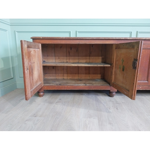 51 - 19th C. Irish painted pine side cabinet with four doors raised on bun feet {91 cm H x 247 cm W x 48 ... 