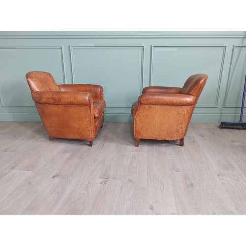 512 - Pair of his and hers French hand dyed leather upholstered tub chairs raised on square tapered legs {... 