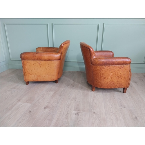 512 - Pair of his and hers French hand dyed leather upholstered tub chairs raised on square tapered legs {... 